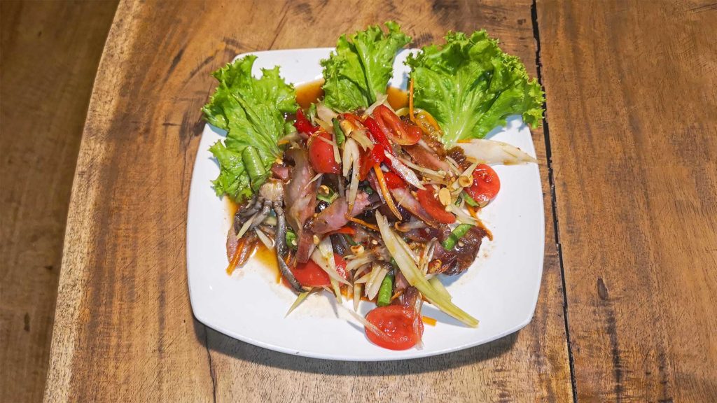 Tam Kor Moo Yang, Papaya Salat mit Schweinenacken